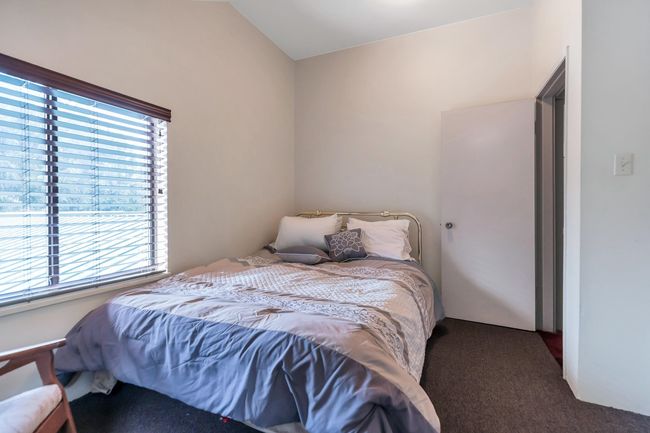 Bedroom with carpet | Image 34