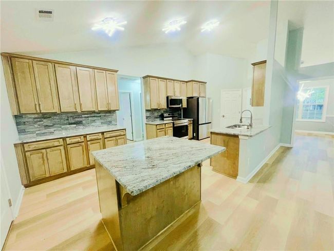 7675 Lanier View Rdg, House other with 3 bedrooms, 2 bathrooms and 2 parking in Cumming GA | Image 13