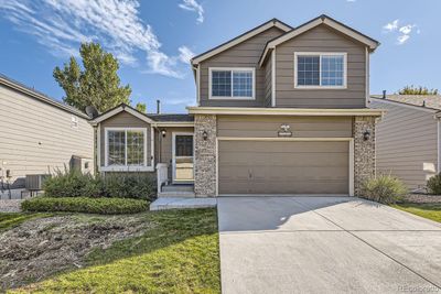 9280 W Indore Drive, House other with 3 bedrooms, 2 bathrooms and 4 parking in Littleton CO | Image 1