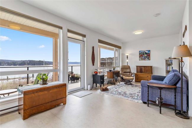Living area featuring a ocean view | Image 4