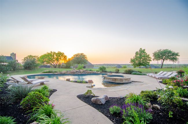 View of pool with a patio | Image 8