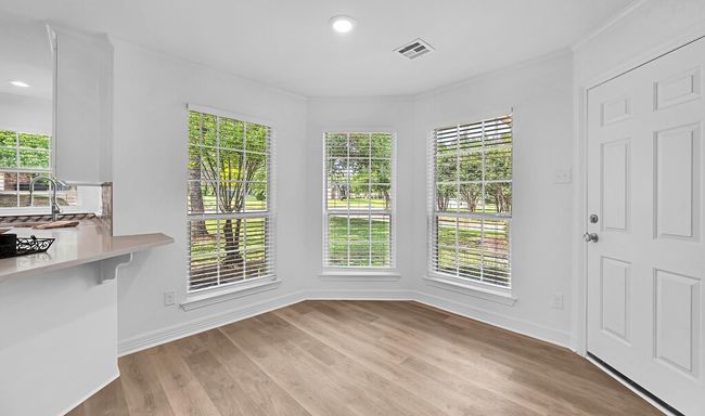 Pretty natural light in the breakfast area, open to the kitchen | Image 15