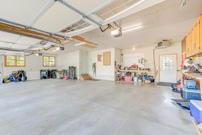 Oversized, heated & insulated 3 stall garage. | Image 22