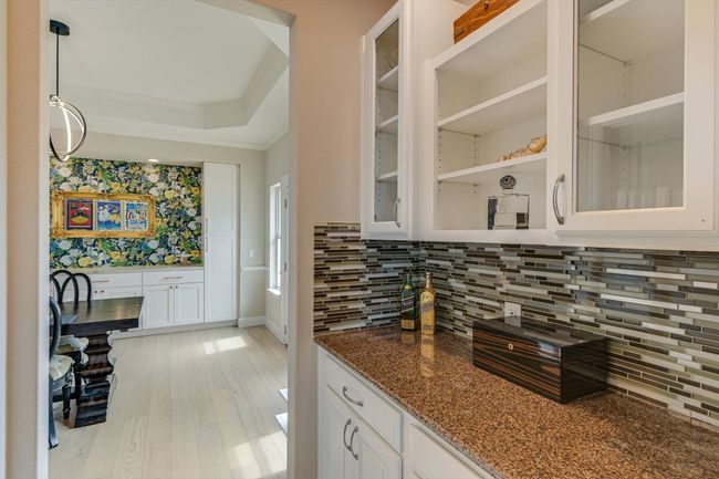 Butler pantry connects the kitchen and formal dining. | Image 10