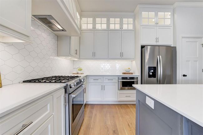 Plenty of cabinetry in the kitchen and built in appliances. | Image 9