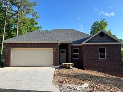 Front of all brick-faced home Faces East | Image 1