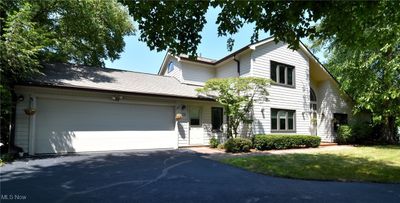 View of front of home featuring a garage | Image 1