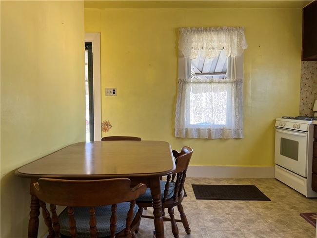 Another angle view of kitchen. | Image 6