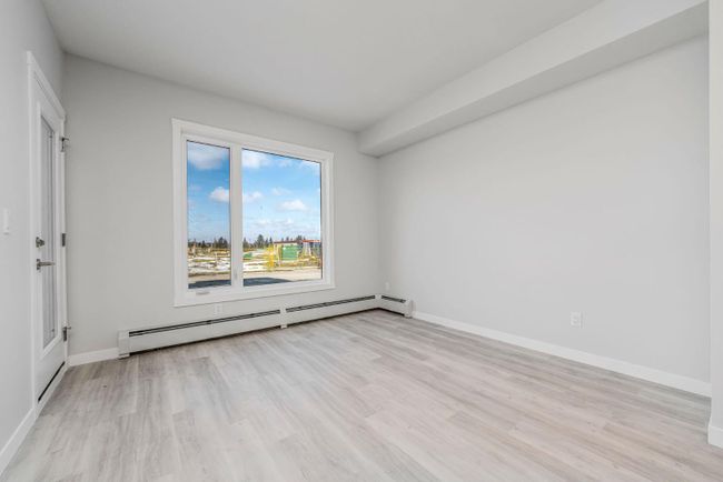 111 - 200 Shawnee Square Sw, Home with 2 bedrooms, 1 bathrooms and 1 parking in Calgary AB | Image 4