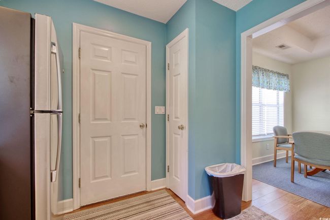 Entryway with light wood finished floors and baseboards | Image 16