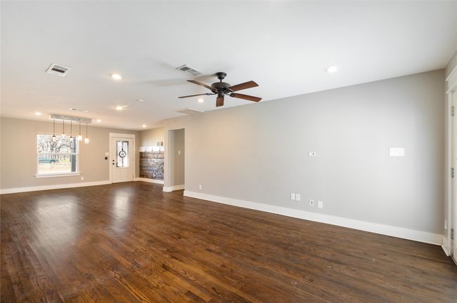 Large living room with space for multiple furniture arrangements | Image 14