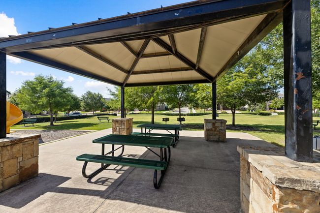 View of property's community with a gazebo, a patio area, and a yard | Image 33