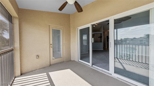 Balcony featuring a ceiling fan | Image 17