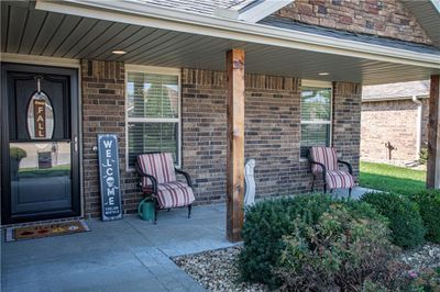 Doorway to property with a porch | Image 3