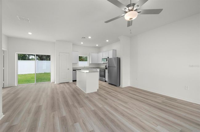 13458 Leaping Water Way, House other with 3 bedrooms, 3 bathrooms and null parking in ASTATULA FL | Image 7