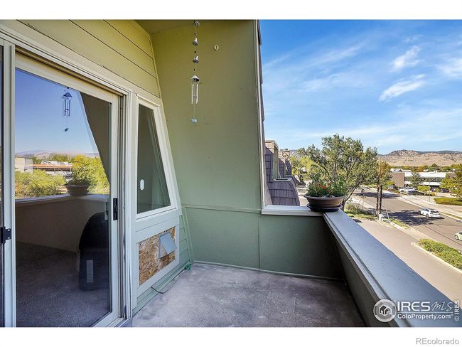 Living room opens to a large private patio with amazing views. Enjoy the birds singing as you have your cup of coffee on the patio | Image 8