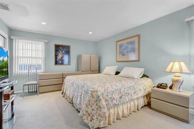 Bedroom with light carpet | Image 20