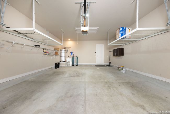 Garage with elevated storage | Image 19