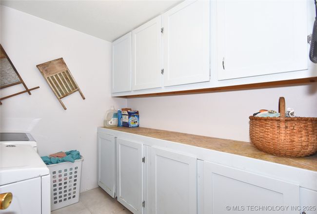 Tons of storage in the Laundry room. | Image 34