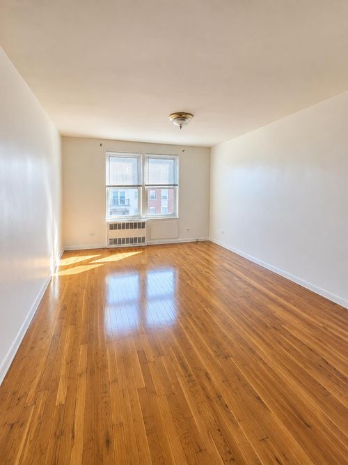 f2-97-11 63rd Drive, New York City, NY, 11374 | Card Image