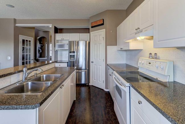 218 Evansmeade Close Nw, House other with 3 bedrooms, 4 bathrooms and 2 parking in Calgary AB | Image 5