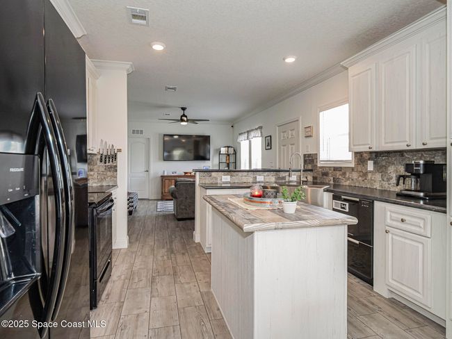 623 Hyacinth Cir, House other with 3 bedrooms, 2 bathrooms and null parking in Barefoot Bay FL | Image 20