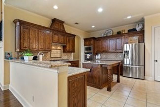 9135 Parson Dr, House other with 5 bedrooms, 4 bathrooms and null parking in Lantana TX | Image 9