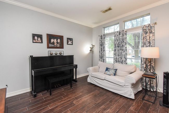Chat with friends or grab a book, this formal living room is the perfect space to relax and have sweet memorable conversations. | Image 19