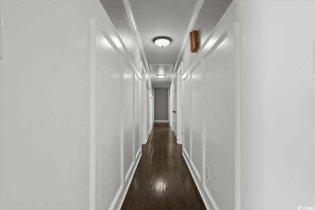 Corridor with dark wood-style flooring | Image 18