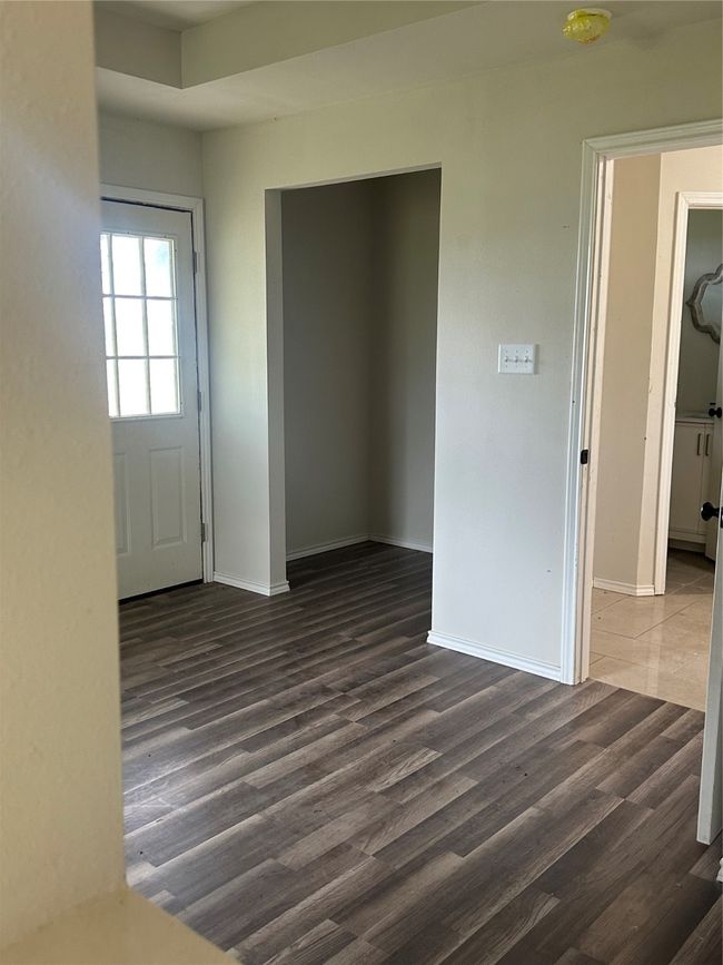 Entrance foyer featuring wood finished floors and baseboards | Image 19