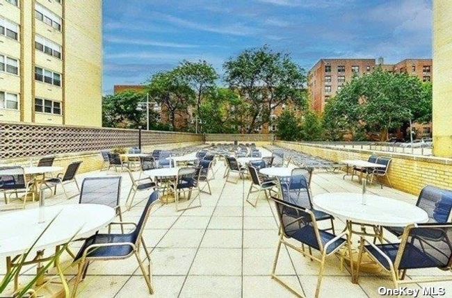 View of patio featuring outdoor dining area and fence | Image 15