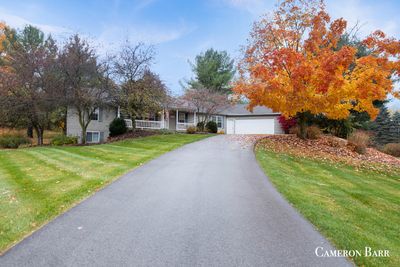 6870 Brow Myer Drive Ne, House other with 4 bedrooms, 3 bathrooms and null parking in Rockford MI | Image 1