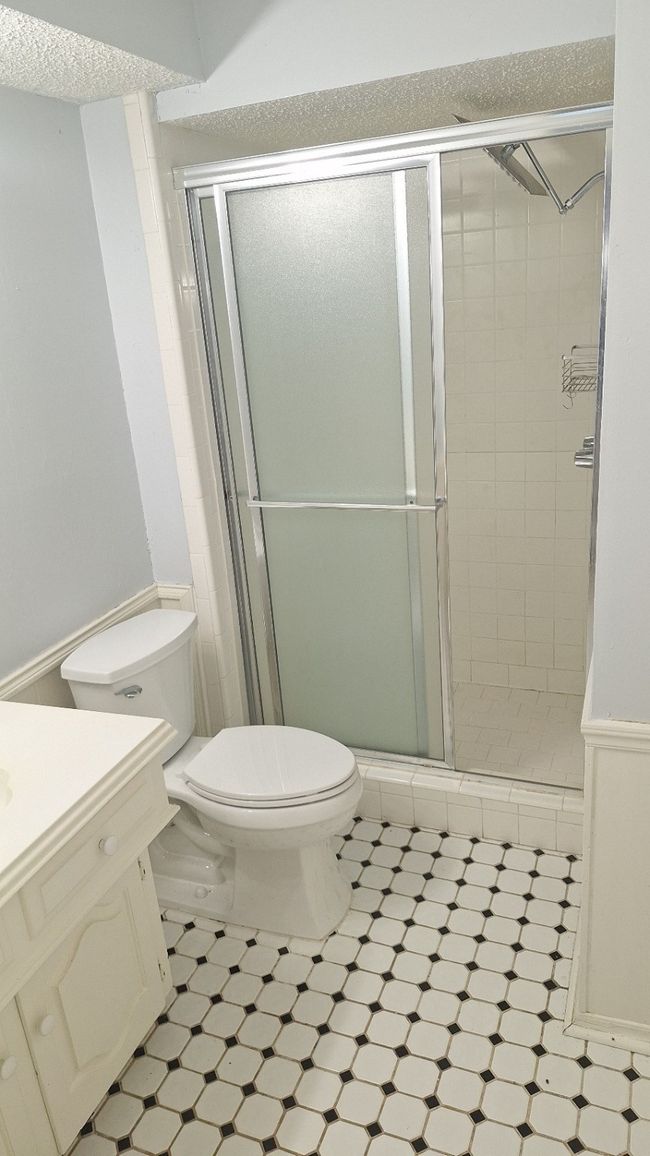 Full bath with vanity and a stall shower | Image 20