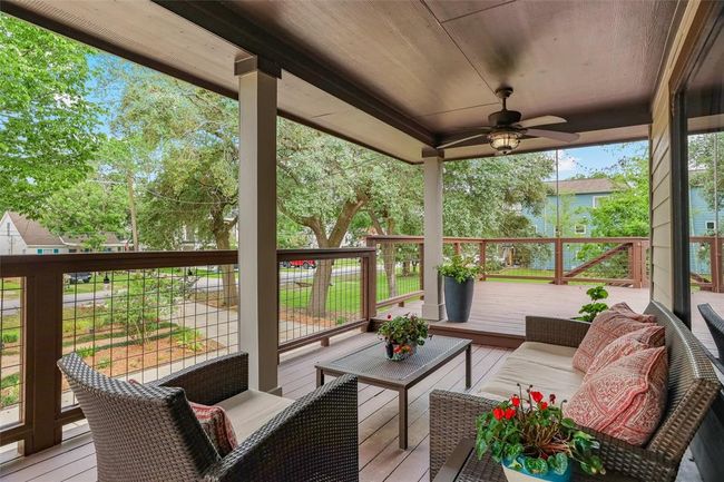 Covered patio off the kitchen/dining area, perfect for morning coffee or relaxing after a long day | Image 31
