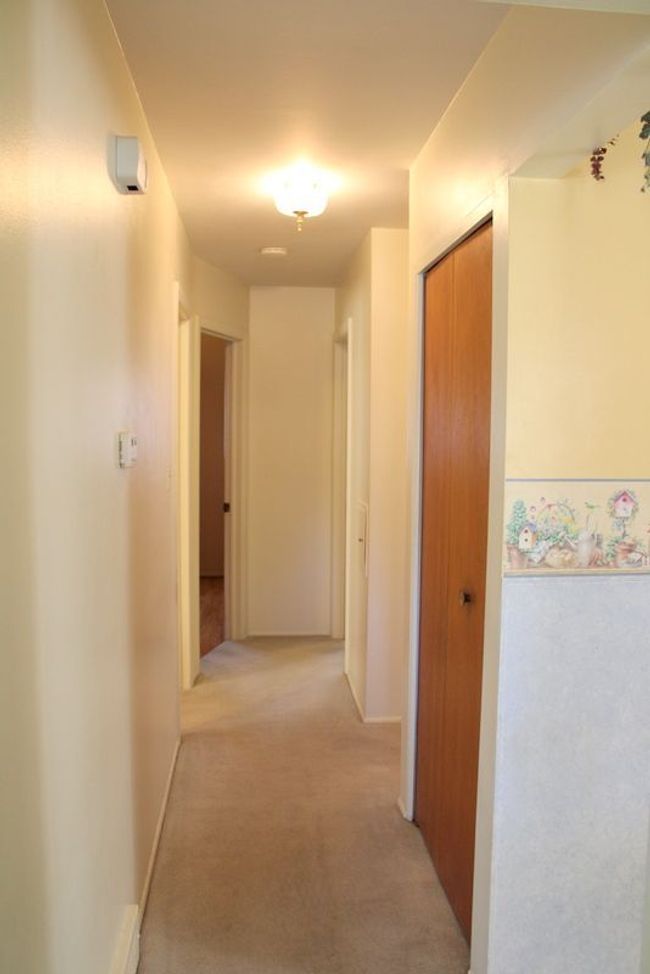 HALL W/2 LINEN CLOSETS + CLOTHES CHUTE TO BSMNT! | Image 12