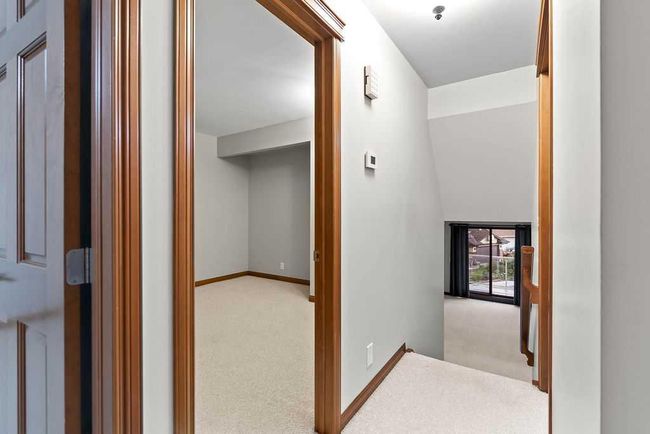 76 Coach Gate Way Sw, House other with 3 bedrooms, 2 bathrooms and 4 parking in Calgary AB | Image 19