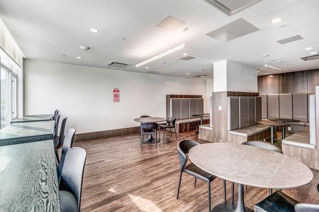 Dining room featuring wood finished floors and recessed lighting | Image 19
