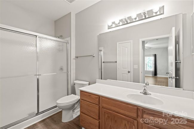 Primary bath with step-in shower, lots of counter space, and a linen closet | Image 28