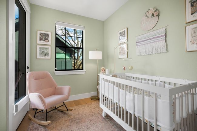 A beautifully designed nursery off the primary suite that also functions as a dedicated home office. | Image 22