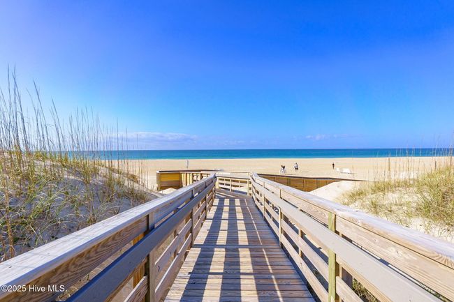 Walkway from condo complex | Image 9