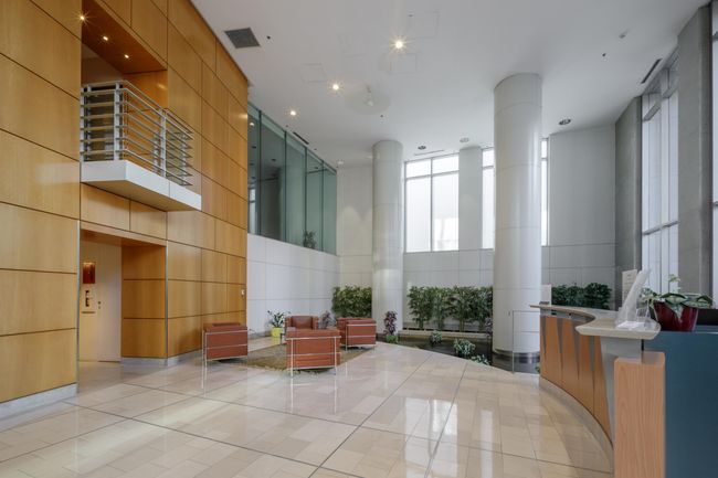 Common area featuring a high ceiling | Image 18