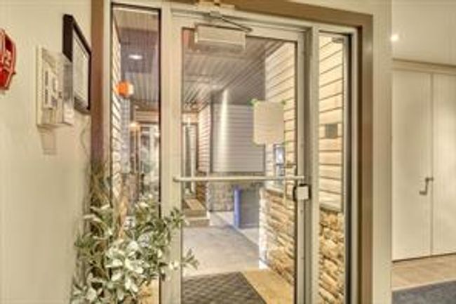 3406 - 15 Sunset Sq, Condo with 2 bedrooms, 2 bathrooms and 2 parking in Cochrane AB | Image 36
