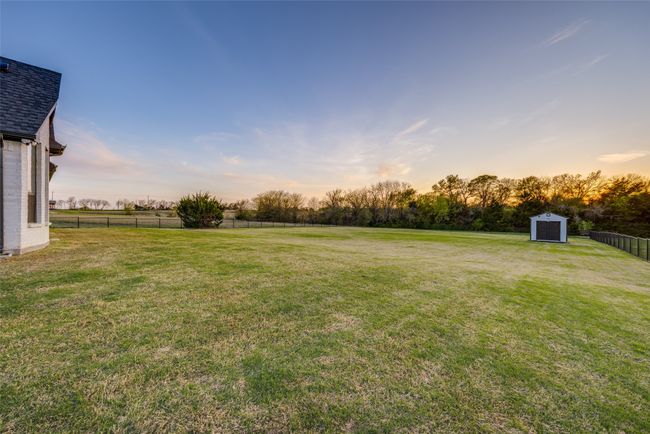 View of yard with fence | Image 24