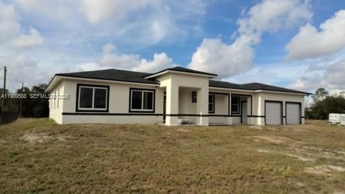 1715 Mcarthur Ave, Lehigh Acres, FL, 33972 | Card Image