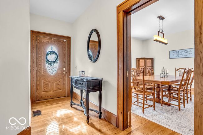 foyer with hardwood / wood-style flooring and baseboards | Image 14