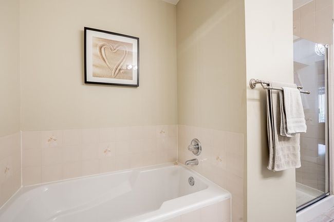 Bathroom with a garden tub and a stall shower | Image 19