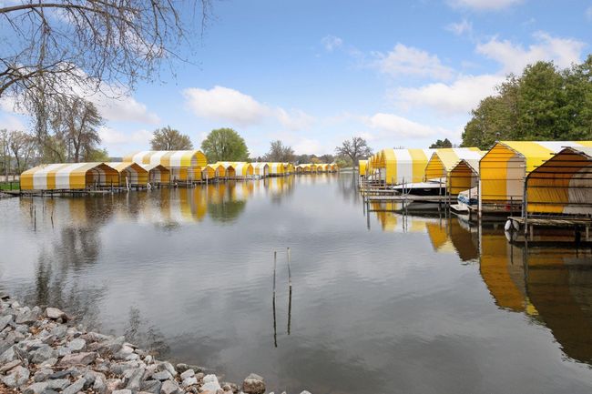 A home for up to a 36 ft boat at a 32 foot permanent covered dock with electricity. | Image 44