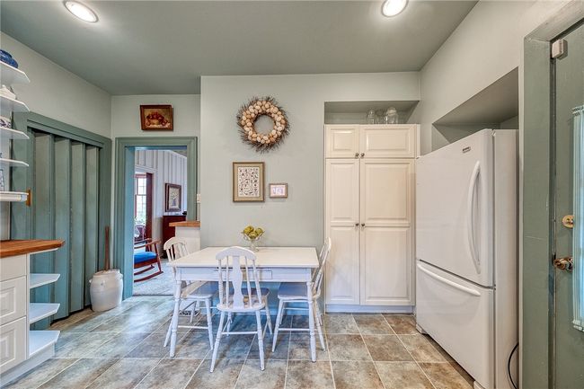 Pantry with room for eat in kitchen area | Image 14