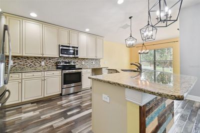 6734 Wild Elm Court, House other with 4 bedrooms, 2 bathrooms and null parking in Wesley Chapel FL | Image 2