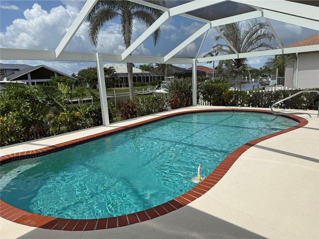 1128 Rum Cay Ct, House other with 3 bedrooms, 2 bathrooms and null parking in PUNTA GORDA FL | Image 49